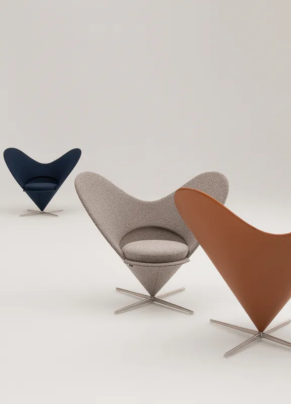 Drei skulpturale Heart Cone Chairs in Blau, Beige und Braun auf Sternfuß vor hellem Hintergrund, minimalistische Studioaufnahme.